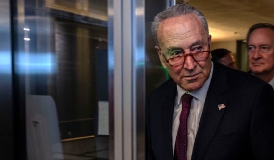 Senate Majority Leader Sen. Chuck Schumer arrives at a news Monday in Beijing, where Schumer leading a bipartisan U.S. Senate delegation visit to China.