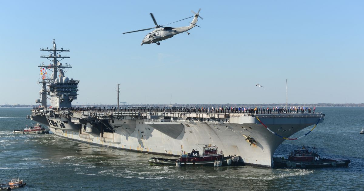 USS Dwight D Eisenhower makes its approach pier side at Naval Station Norfolk after a six-month deployment to the United States 5th and 6th fleet areas of responsibility in support of Operation Enduring Freedom, Norfolk, Virginia, Dec. 19, 2012.