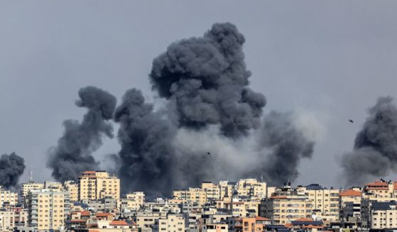 Smoke rises over Gaza City on Saturday during Israeli air strikes.