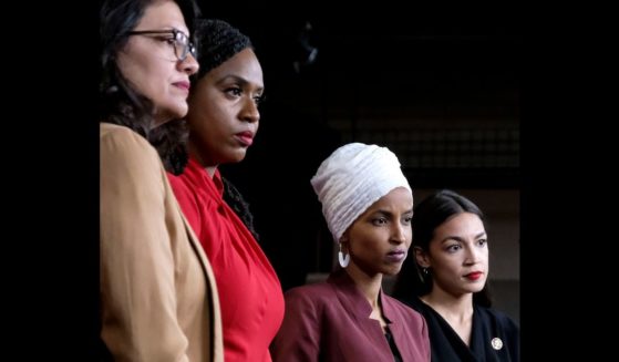 Reps. Rashida Tlaib (D-MI), Ayanna Pressley (D-MA), Ilhan Omar (D-MN), and Alexandria Ocasio-Cortez (D-NY) pause between answering questions during a press conference at the U.S. Capitol on July 15, 2019, in Washington, D.C.