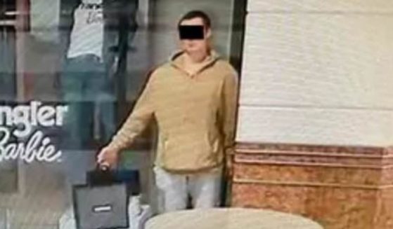 An unidentified man was arrested in Warsaw, Poland, on theft and burglary charges after reportedly posing as a mannequin in a store window.