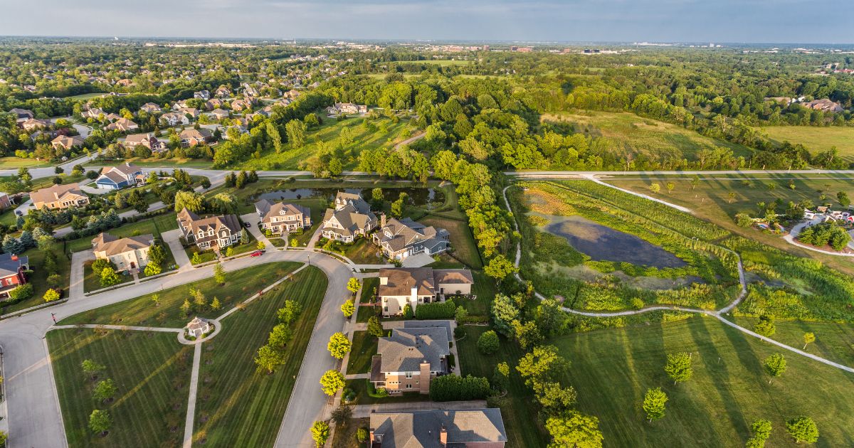 The above image is of an aerial view of a suburb.