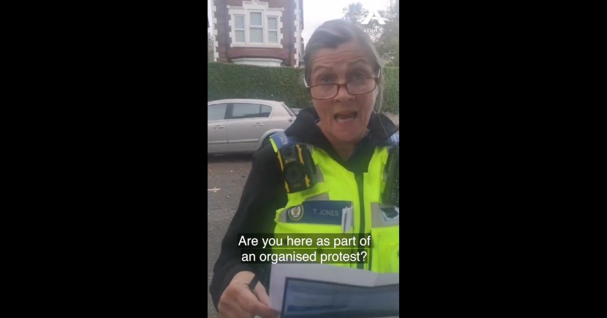 This Twitter screen shot shows a police officer interrogating a pro-life woman in the U.K.
