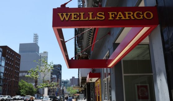People pass by a Wells Fargo bank on May 17, 2023 in New York City.
