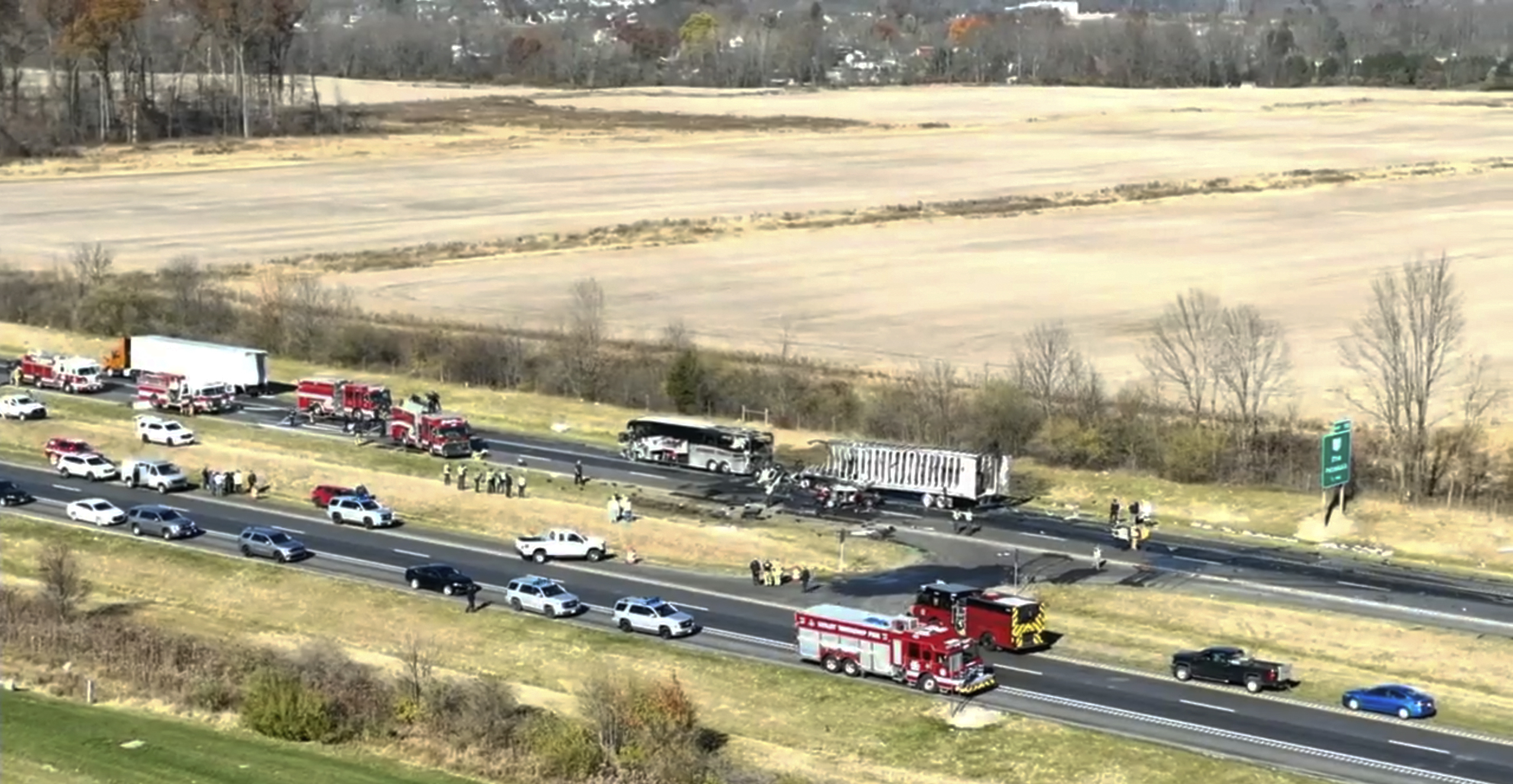 Emergency responders work the scene after a semi-truck crashed into a charter bus carrying high school students in Licking County, Ohio, on Nov. 14.