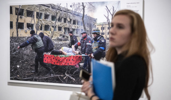 Photograph titled "Mariupol Maternity Hospital Aistrike" is on display at the opening of the World Press Photo 2023 exhibition at the Hungarian National Museum in Budapest, Hungary, on Sept. 21. The director of the Hungarian National Museum was fired for displaying LGBT content that violated the 2021 "child protection" law.
