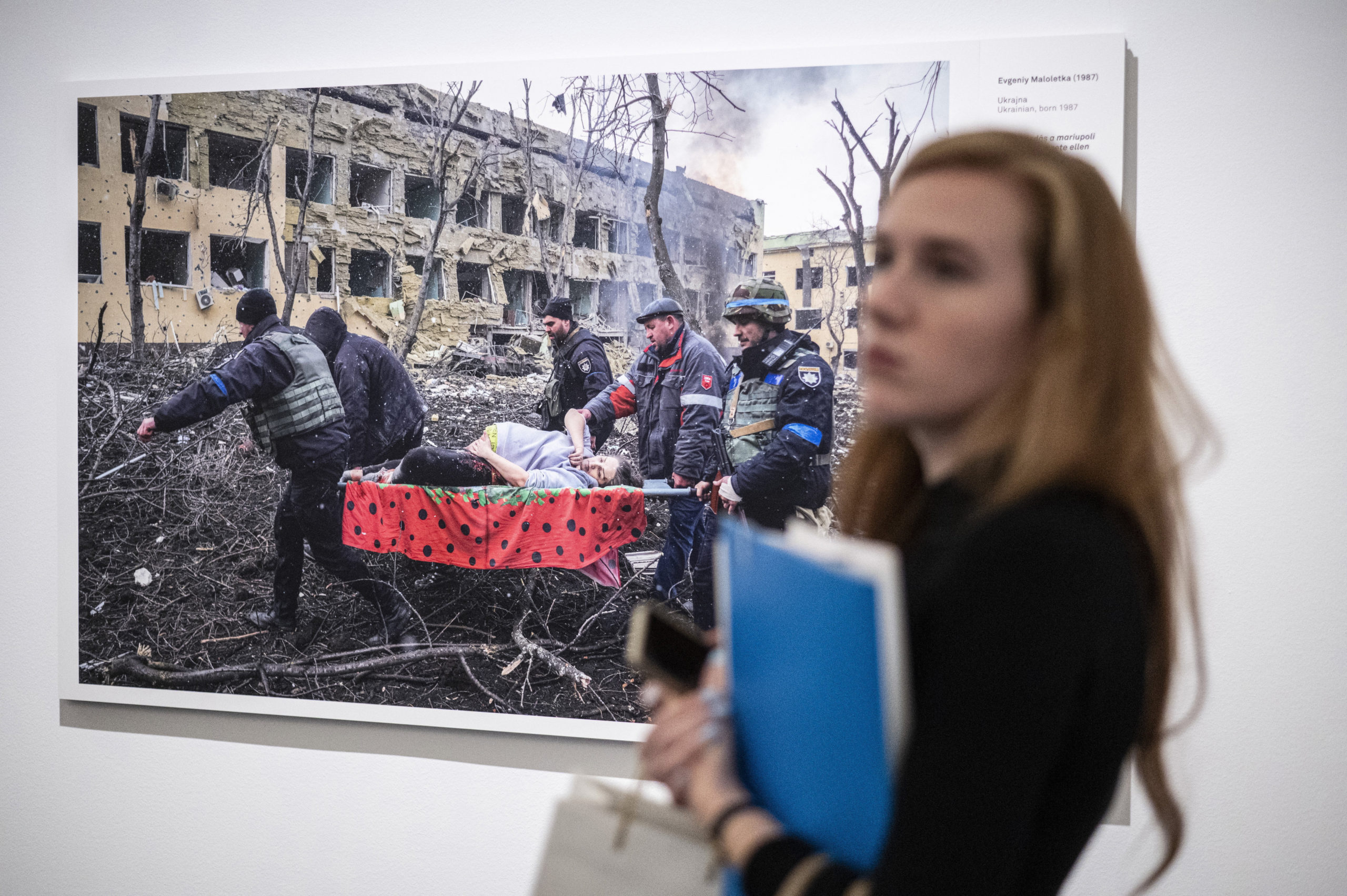 Photograph titled "Mariupol Maternity Hospital Aistrike" is on display at the opening of the World Press Photo 2023 exhibition at the Hungarian National Museum in Budapest, Hungary, on Sept. 21. The director of the Hungarian National Museum was fired for displaying LGBT content that violated the 2021 "child protection" law.