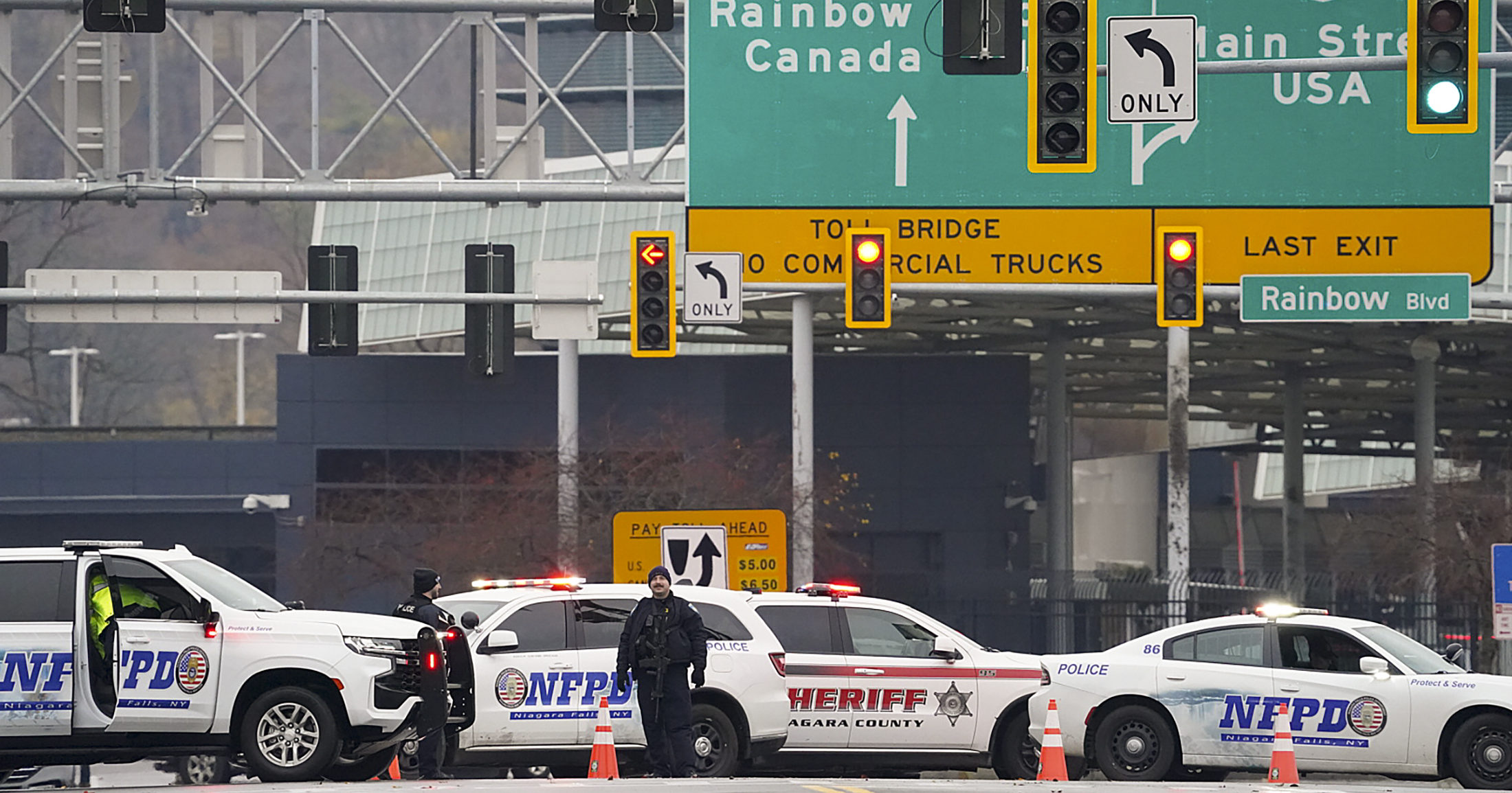 Law enforcement personnel block the entrance to the Rainbow Bridge on Wednesday in Niagara Falls, New York.