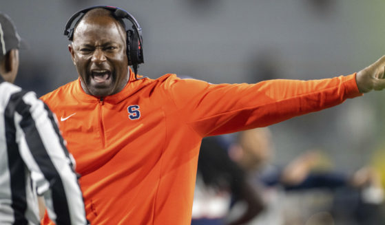 Syracuse coach Dino Babers yells to an official during the second half of the team's NCAA college football against Georgia Tech, Saturday, November 18, 2023, in Atlanta.