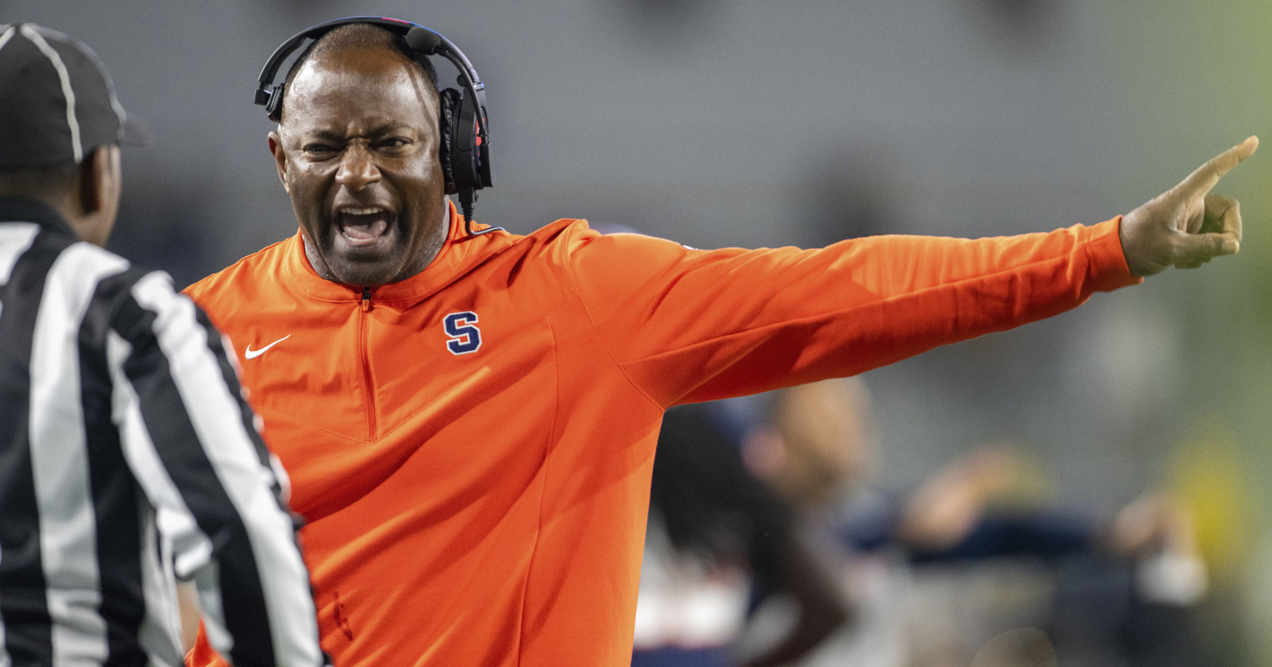 Syracuse coach Dino Babers yells to an official during the second half of the team's NCAA college football against Georgia Tech, Saturday, November 18, 2023, in Atlanta.
