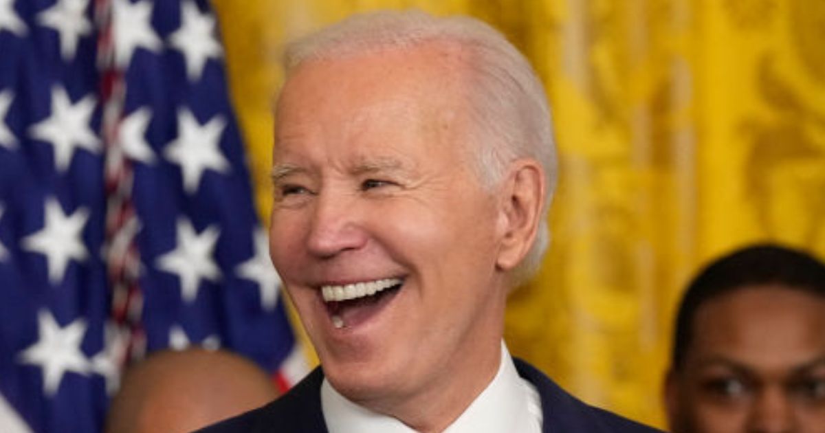 President Joe Biden is seen laughing during a White House ceremony in January.