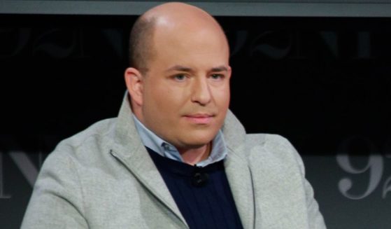 Brian Stelter speaks with Kara Swisher about his new book "Network of Lies" in New York City on Nov. 14. In its first week, Stelter's book has suffered poor sales.