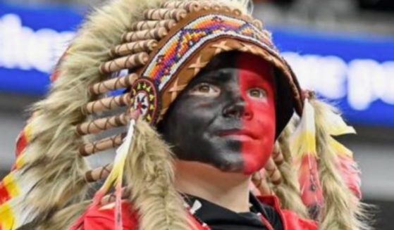 During Sunday's NFL game between the Kansas City Chiefs and the Las Vegas Raiders, a young Chiefs fan became the center of controversy for his alleged "blackface." But that wasn't the whole story, as his face was painted both black and red, and now his mother is speaking out to shed more light on the matter.