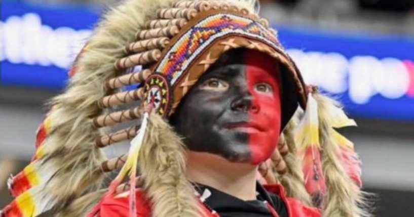 During Sunday's NFL game between the Kansas City Chiefs and the Las Vegas Raiders, a young Chiefs fan became the center of controversy for his alleged "blackface." But that wasn't the whole story, as his face was painted both black and red, and now his mother is speaking out to shed more light on the matter.