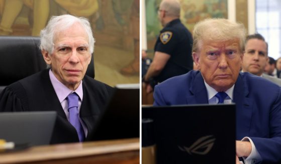 Justice Arthur Engoron and former President Donald Trump sit in the courtroom at the New York Supreme Court on Oct. 25 in New York City.
