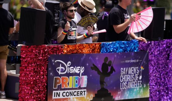 Members of the Gay Men's Chorus of Los Angeles promote a Disney "pride" concert during an LGBT parade in West Hollywood, California, on June 4.