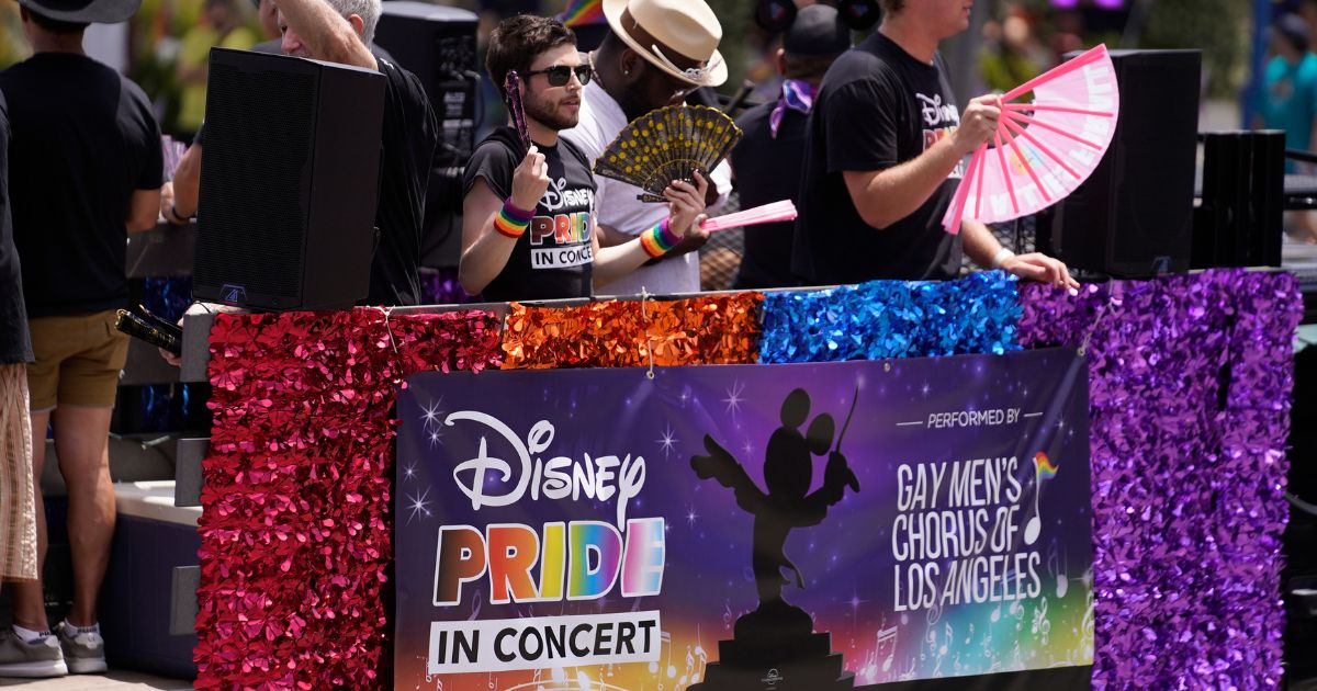 Members of the Gay Men's Chorus of Los Angeles promote a Disney "pride" concert during an LGBT parade in West Hollywood, California, on June 4.