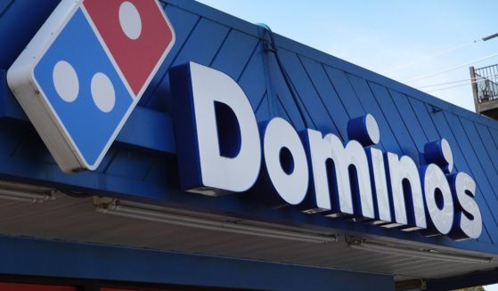 Domino's pizza restaurants were inundated with orders when a pizza giveaway got out of control.