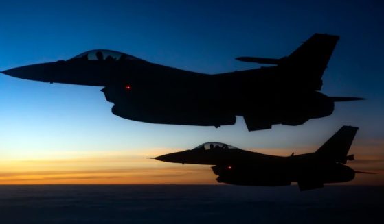 Two Air Force F-16 Fighting Falcons assigned to the 121st Expeditionary Fighter Squadron fly over U.S. Central Command’s area of responsibility during a mission in support of Combined Joint Task Force-Operation Inherent Resolve on July 17, 2021.