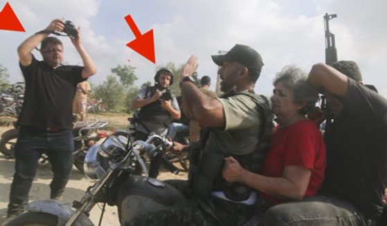 A photo surfaced of alleged free lance journalists embedded with Hamas terrorists during the Oct. 7 attack on Israel.