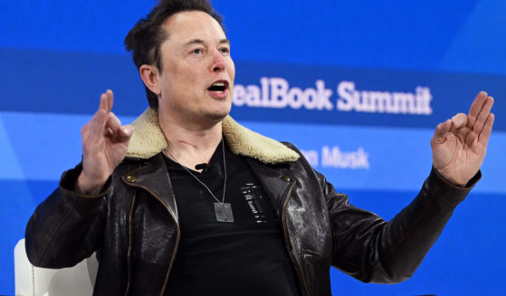 Elon Musk speaks onstage Thursday during The New York Times Dealbook Summit in New York City.