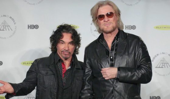 John Oates, left, and Daryl Hall appear in the press room at the Rock and Roll Hall of Fame induction ceremony in New York on April, 10, 2014.