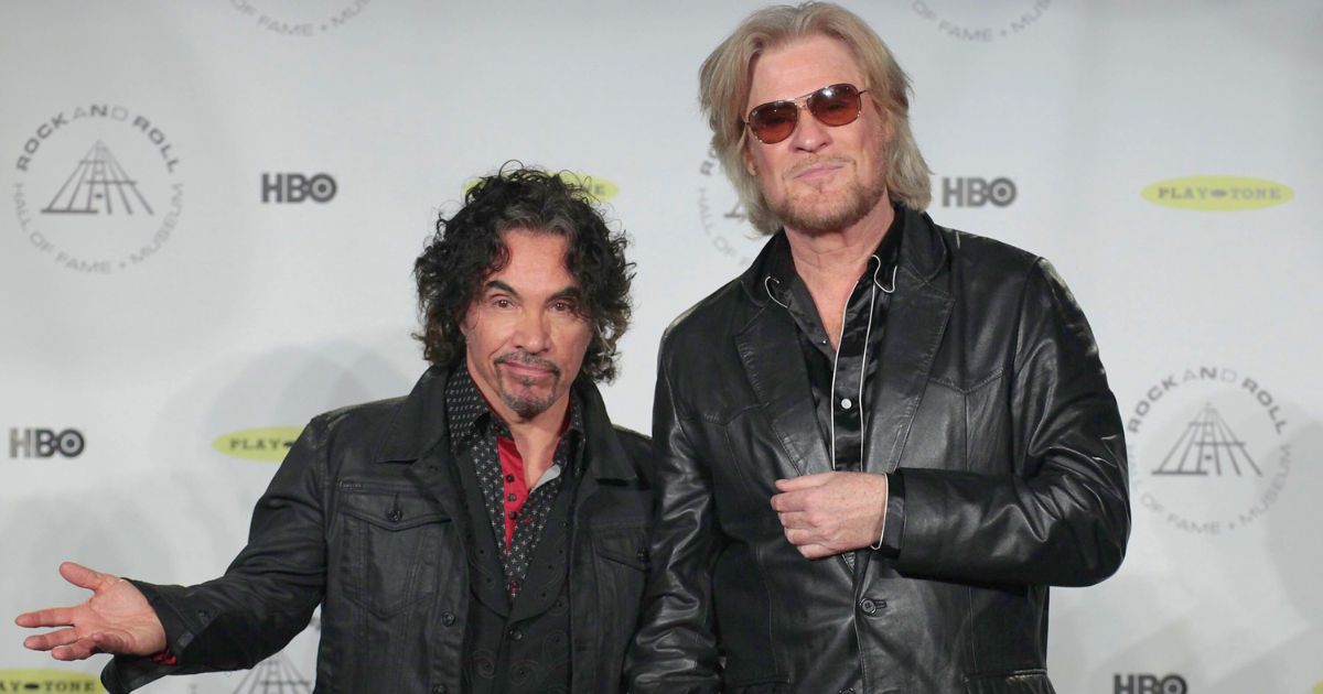 John Oates, left, and Daryl Hall appear in the press room at the Rock and Roll Hall of Fame induction ceremony in New York on April, 10, 2014.