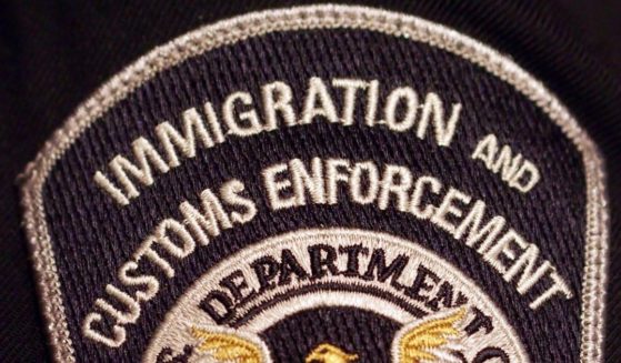 An Immigration and Customs Enforcement badge on a uniform is pictured as part of an exhibit in Washington, D.C., on March 5, 2014.