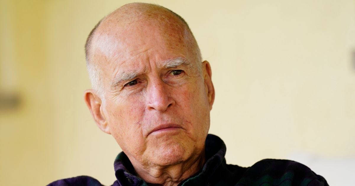 Former California Gov. Jerry Brown talks to a reporter at his ranch near Williams, California, on March 2, 2022.