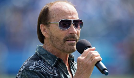 Lee Greenwood performs before a game between the Dallas Cowboys and the Tennessee Titans in Nashville, Tennessee, on Sept. 14, 2014. Greenwood has recently announced his plans for retirement.