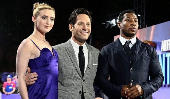 Jonathan Majors, right, poses with Kathryn Newton and Paul Rudd at a screening of "Marvel's Ant-Man and the Wasp: Quantumania" at BFI IMAX Waterloo in London on Feb. 16.