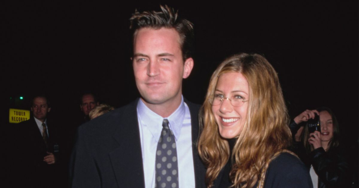 Actor Matthew Perry, left, is seen with actress Jennifer Aniston at a movie premiere in February of 1998. Aniston posted on social media this week about the impact Perry's death has had on the other members of the "Friends" cast.