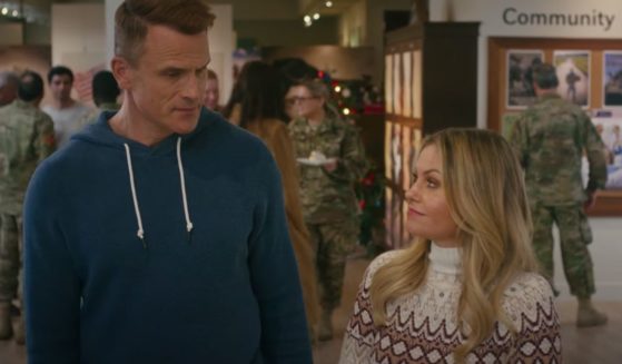 Candace Cameron Bure, right, and Gabriel Hogan, left, star in a new Christmas movie - "My Christmas Hero" - that honors veterans, faith, and family.