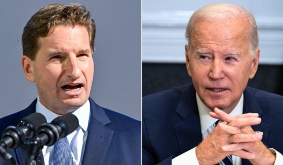 At left, Rep. Dean Phillips of Minnesota holds a rally outside of the New Hampshire Statehouse in Concord after handing over his declaration of candidacy form on Oct. 27. At right, President Joe Biden speaks during a meeting in the Roosevelt Room of the White House in Washington on Tuesday.