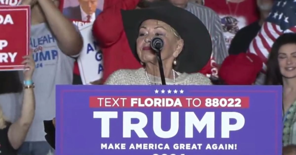 Roseanne Barr speaking to the crowd at a Trump rally