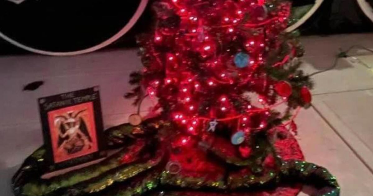 Two entries in the Wisconsin Christmas Tree Festival have sparked outrage, including this entry from the Satanic Temple of Wisconsin, which has ornaments saying "Hail Santa" and pentagrams.