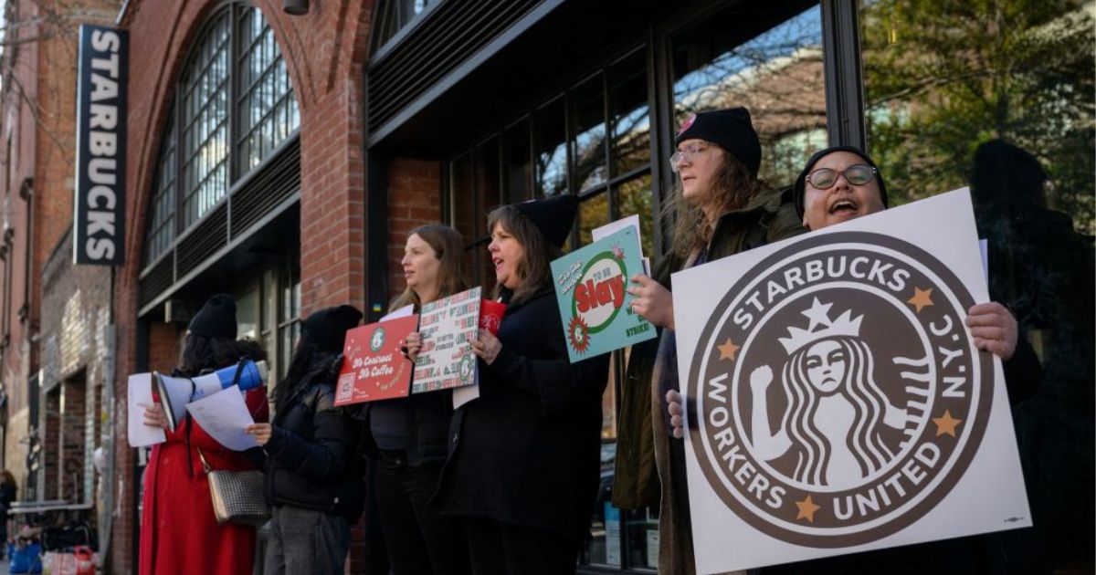 tarbucks workers strike Thursday outside a Starbucks coffee shop in the Brooklyn borough of New York City. Dubbed the "Red Cup Rebellion," the one-day strike coincided with a popular annual event in which Starbucks hands out reusable cups with holiday drink purchases.