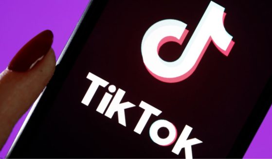 The TikTok logo is displayed on the screen of an iPhone on March 5, 2019, in Paris.