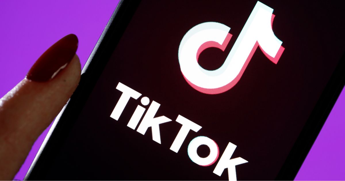 The TikTok logo is displayed on the screen of an iPhone on March 5, 2019, in Paris.