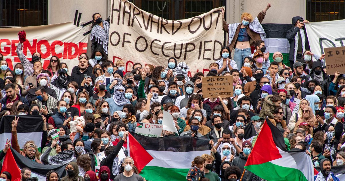 Protesters gather at Harvard University Oct. 14 to show their support for Palestinians in Gaza at a rally in Cambridge, Massachusetts. A group of law firms has warned prominent law schools that it will not tolerate ant-Semitic sentiments or condone violence against Israel.