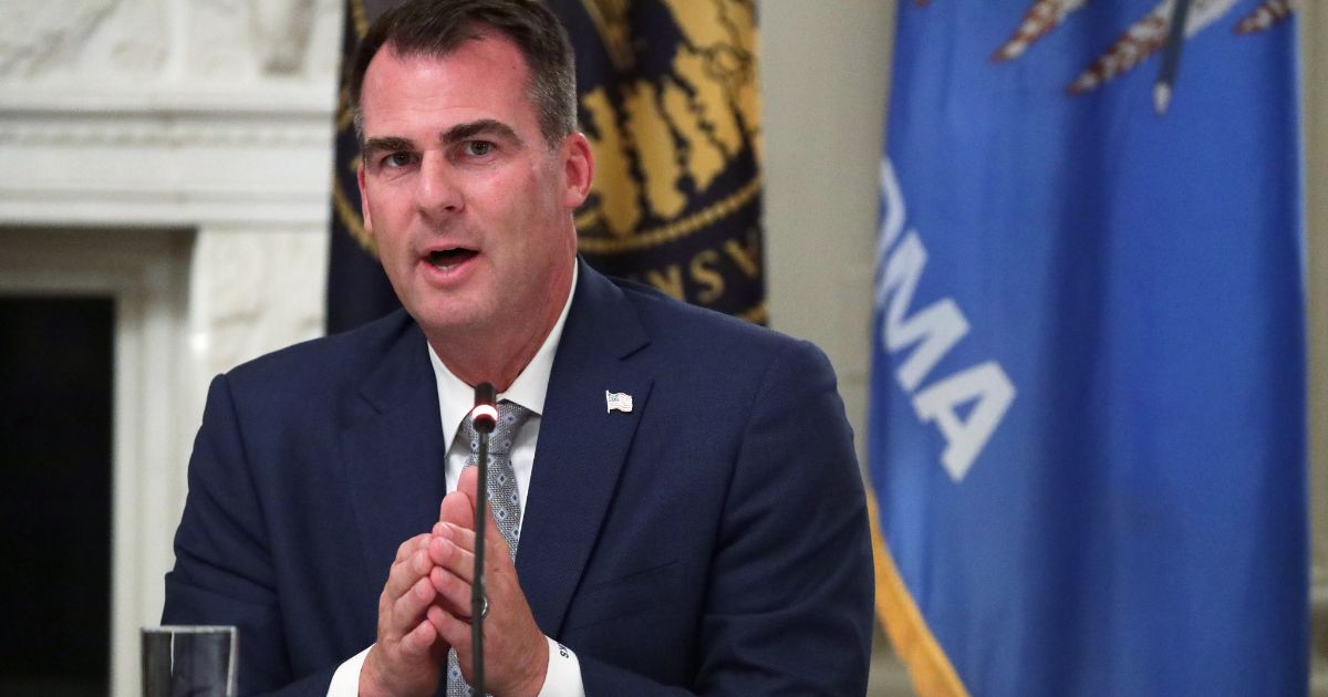 Oklahoma Republican Gov. Kevin Stitt speaks during a business roundtable in the White House on June 18, 2020.