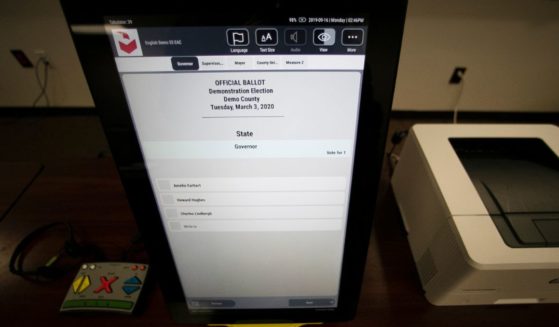 A sample ballot is shown on a Dominion Voting Systems machine in Atlanta on Sept. 16, 2019.