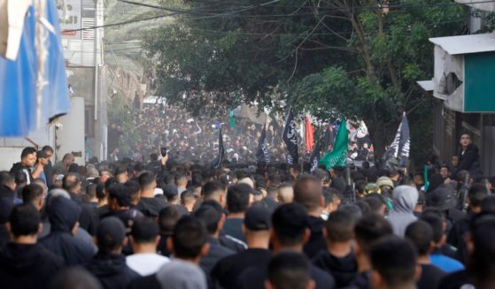 Palestinian mourners carry the body of one of the six Palestinians killed in clashes with Israeli forces during a funeral in the West Bank city of Tulkarem on Wednesday.