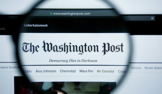 The homepage of the Washington Post website is displayed on a computer screen in this stock image.
