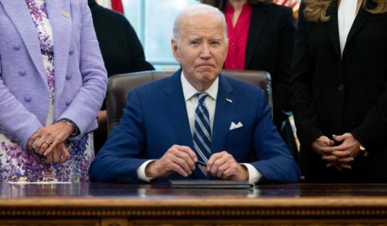 President Joe Biden looks on after signing a Presidential Memorandum establishing the first-ever White House Initiative on Women's Health Research, in the Oval Office of the White House in Washington, D.C., on Monday.