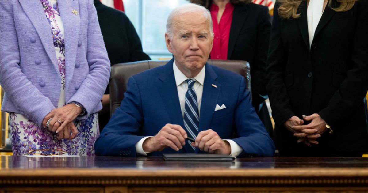 President Joe Biden looks on after signing a Presidential Memorandum establishing the first-ever White House Initiative on Women's Health Research, in the Oval Office of the White House in Washington, D.C., on Monday.