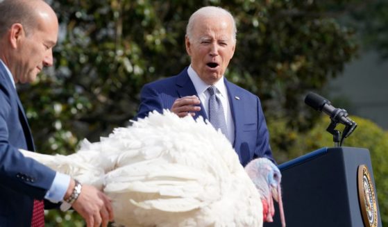 President Joe Biden pardons the national Thanksgiving turkeys, Liberty and Bell, during a pardoning ceremony on the South Lawn of the White House in Washington, D.C., on Monday.