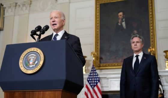 President Joe Biden, joined by Secretary of State Antony Blinken, delivers remarks on the Hamas terrorist attacks in Israel in the State Dining Room of the White House Oct. 10 in Washington, D.C.