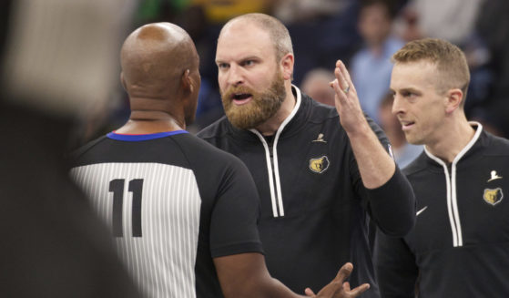 Memphis Grizzlies coach Taylor Jenkins argues with official Derrick Collins after the ejection of forward Jaren Jackson Jr. during the second half of the team’s NBA basketball in-season tournament game against the Utah Jazz on November 10, 2023, in Memphis, Tennessee.