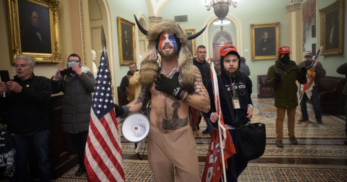 A mob confronts U.S. Capitol police outside the Senate chamber of the U.S. Capitol Building on January 06, 2021 in Washington, DC.